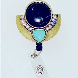 Retractable badge holder